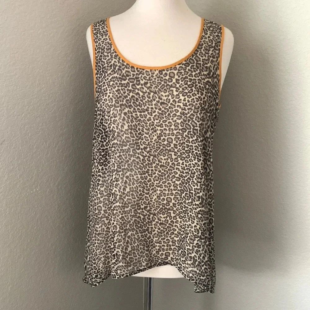 H.I.P. leopard print semi sheer tank with mustard yellow piping and keyhole back